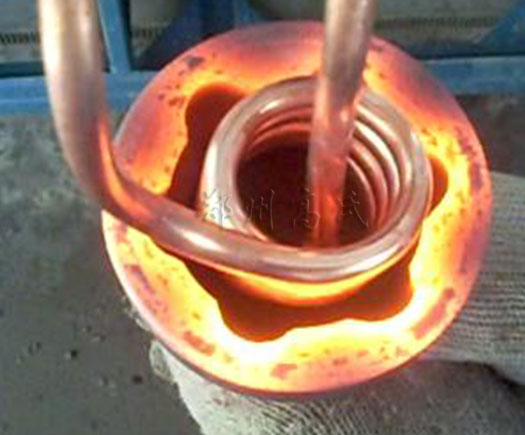 球籠內(nèi)孔淬火采用中頻淬火機進行