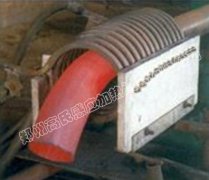 利用中頻淬火爐對鋼管外徑進(jìn)行透熱折彎鍛造